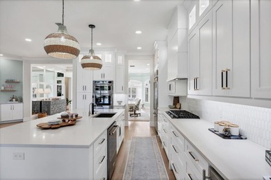 Welcome to an exceptional residence in the heart of University on University Park Country Club in Florida - for sale on GolfHomes.com, golf home, golf lot