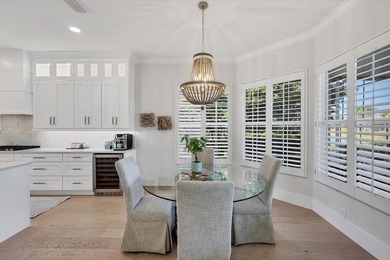 Welcome to an exceptional residence in the heart of University on University Park Country Club in Florida - for sale on GolfHomes.com, golf home, golf lot