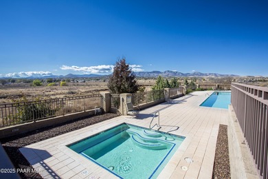 Set in the desirable Quailwood community, this impressive home on Quail Wood Greens Golf Course in Arizona - for sale on GolfHomes.com, golf home, golf lot