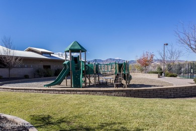 Set in the desirable Quailwood community, this impressive home on Quail Wood Greens Golf Course in Arizona - for sale on GolfHomes.com, golf home, golf lot