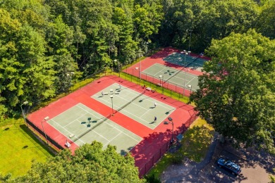 Welcome to this beautifully updated end-unit 3-bedroom, 2.5-bath on Farmington Woods Country Club in Connecticut - for sale on GolfHomes.com, golf home, golf lot