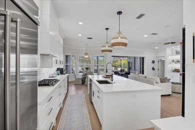 Welcome to an exceptional residence in the heart of University on University Park Country Club in Florida - for sale on GolfHomes.com, golf home, golf lot