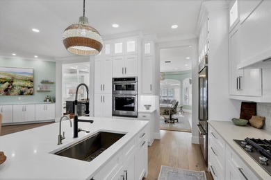 Welcome to an exceptional residence in the heart of University on University Park Country Club in Florida - for sale on GolfHomes.com, golf home, golf lot