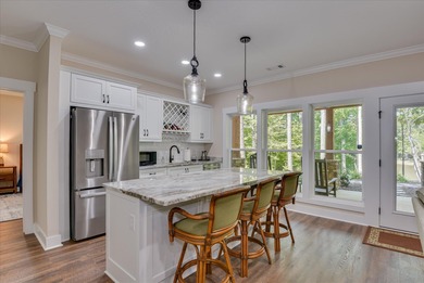 SOME PEOPLE DO EVERYTHING RIGHT! This LAKE FRONT home was CUSTOM on Monticello Golf Club At Savannah Lakes in South Carolina - for sale on GolfHomes.com, golf home, golf lot