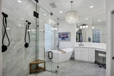 Welcome to an exceptional residence in the heart of University on University Park Country Club in Florida - for sale on GolfHomes.com, golf home, golf lot