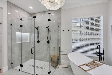 Welcome to an exceptional residence in the heart of University on University Park Country Club in Florida - for sale on GolfHomes.com, golf home, golf lot