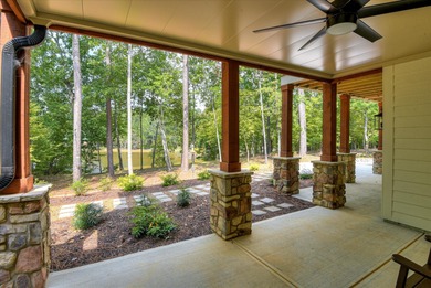 SOME PEOPLE DO EVERYTHING RIGHT! This LAKE FRONT home was CUSTOM on Monticello Golf Club At Savannah Lakes in South Carolina - for sale on GolfHomes.com, golf home, golf lot