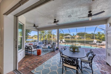 Welcome to an exceptional residence in the heart of University on University Park Country Club in Florida - for sale on GolfHomes.com, golf home, golf lot