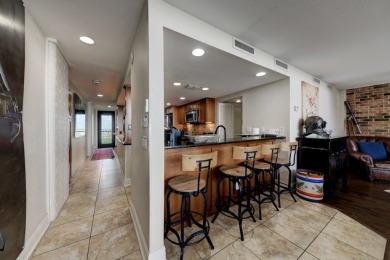 Experience elevated coastal living in this stunning 8th-floor on Palmilla Beach Golf Club in Texas - for sale on GolfHomes.com, golf home, golf lot