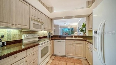 Nestled in the heart of the highly sought-after and welcoming on Stoneybrook Golf and Country Club of Sarasota in Florida - for sale on GolfHomes.com, golf home, golf lot