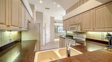 Nestled in the heart of the highly sought-after and welcoming on Stoneybrook Golf and Country Club of Sarasota in Florida - for sale on GolfHomes.com, golf home, golf lot