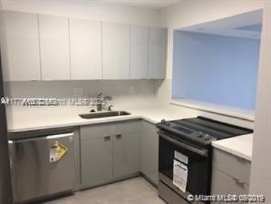 BEAUTIFUL MODERN 2 BEDROOM DIRECTLY ON COUNTRY CLUB CIRCLE on Turnberry Isle Resort and Club in Florida - for sale on GolfHomes.com, golf home, golf lot