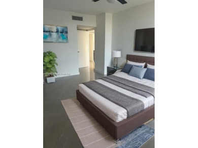 BEAUTIFUL MODERN 2 BEDROOM DIRECTLY ON COUNTRY CLUB CIRCLE on Turnberry Isle Resort and Club in Florida - for sale on GolfHomes.com, golf home, golf lot