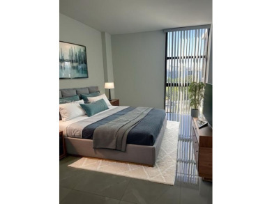 BEAUTIFUL MODERN 2 BEDROOM DIRECTLY ON COUNTRY CLUB CIRCLE on Turnberry Isle Resort and Club in Florida - for sale on GolfHomes.com, golf home, golf lot