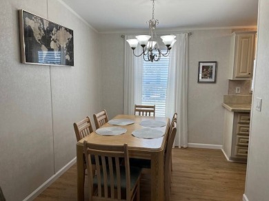 IF YOU ARE LOOKING FOR A 2 BEDROOMN 2 BATH IN MOVE-IN CONDITION on Southport Springs Golf Club in Florida - for sale on GolfHomes.com, golf home, golf lot