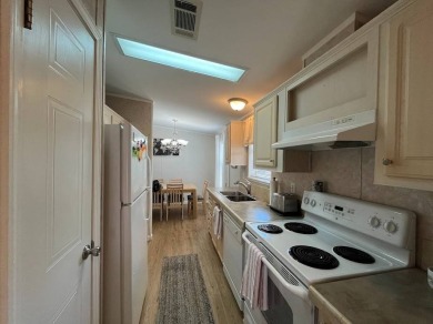 IF YOU ARE LOOKING FOR A 2 BEDROOMN 2 BATH IN MOVE-IN CONDITION on Southport Springs Golf Club in Florida - for sale on GolfHomes.com, golf home, golf lot