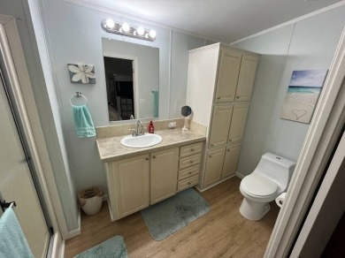 IF YOU ARE LOOKING FOR A 2 BEDROOMN 2 BATH IN MOVE-IN CONDITION on Southport Springs Golf Club in Florida - for sale on GolfHomes.com, golf home, golf lot