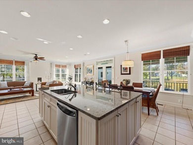 Welcome to 27444 S. Nicklaus Avenue, a refined coastal retreat on The Peninsula Golf and Country Club in Delaware - for sale on GolfHomes.com, golf home, golf lot