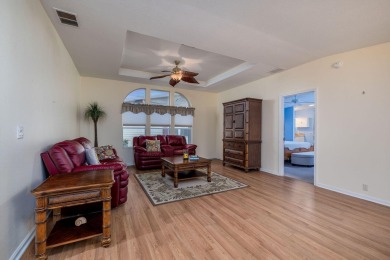 Enjoy peaceful water views and your own Mango Tree from this on Savanna Golf Club in Florida - for sale on GolfHomes.com, golf home, golf lot