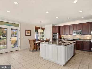 Welcome to 27444 S. Nicklaus Avenue, a refined coastal retreat on The Peninsula Golf and Country Club in Delaware - for sale on GolfHomes.com, golf home, golf lot