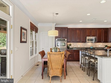 Welcome to 27444 S. Nicklaus Avenue, a refined coastal retreat on The Peninsula Golf and Country Club in Delaware - for sale on GolfHomes.com, golf home, golf lot