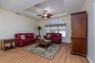 Enjoy peaceful water views and your own Mango Tree from this on Savanna Golf Club in Florida - for sale on GolfHomes.com, golf home, golf lot