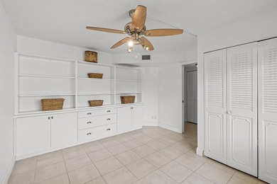 Light, bright, & timelessly renovated 2-bed, 2-bath, 1st-floor on Poinciana Golf Club in Florida - for sale on GolfHomes.com, golf home, golf lot