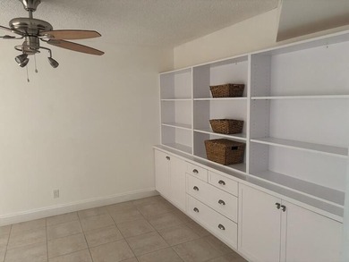 Light, bright, & timelessly renovated 2-bed, 2-bath, 1st-floor on Poinciana Golf Club in Florida - for sale on GolfHomes.com, golf home, golf lot