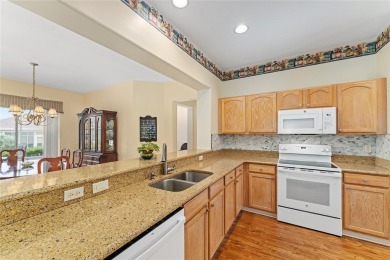 Spacious and thoughtfully designed, this popular Sanibel model on Eagle Ridge At Spruce Creek Country Club in Florida - for sale on GolfHomes.com, golf home, golf lot