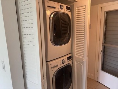 Light, bright, & timelessly renovated 2-bed, 2-bath, 1st-floor on Poinciana Golf Club in Florida - for sale on GolfHomes.com, golf home, golf lot