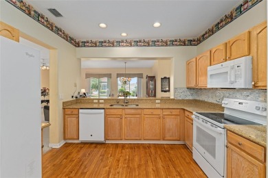Spacious and thoughtfully designed, this popular Sanibel model on Eagle Ridge At Spruce Creek Country Club in Florida - for sale on GolfHomes.com, golf home, golf lot