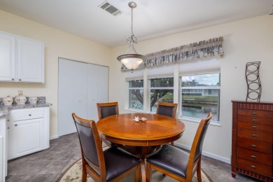 Enjoy peaceful water views and your own Mango Tree from this on Savanna Golf Club in Florida - for sale on GolfHomes.com, golf home, golf lot
