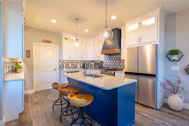 This is an amazing villa recently updated with high-end finishes on Seasons Ridge At Four Seasons in Missouri - for sale on GolfHomes.com, golf home, golf lot