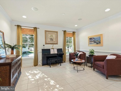 Welcome to 27444 S. Nicklaus Avenue, a refined coastal retreat on The Peninsula Golf and Country Club in Delaware - for sale on GolfHomes.com, golf home, golf lot