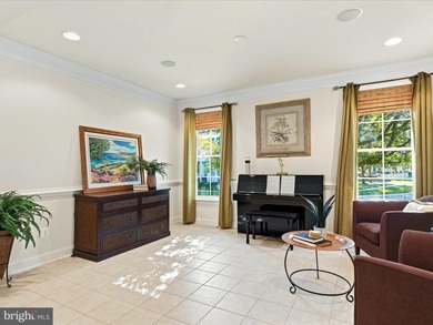 Welcome to 27444 S. Nicklaus Avenue, a refined coastal retreat on The Peninsula Golf and Country Club in Delaware - for sale on GolfHomes.com, golf home, golf lot