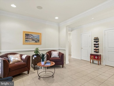 Welcome to 27444 S. Nicklaus Avenue, a refined coastal retreat on The Peninsula Golf and Country Club in Delaware - for sale on GolfHomes.com, golf home, golf lot