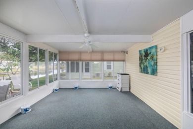 Enjoy peaceful water views and your own Mango Tree from this on Savanna Golf Club in Florida - for sale on GolfHomes.com, golf home, golf lot