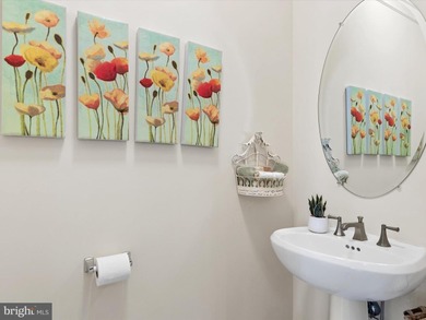 Welcome to 27444 S. Nicklaus Avenue, a refined coastal retreat on The Peninsula Golf and Country Club in Delaware - for sale on GolfHomes.com, golf home, golf lot