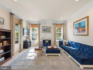 Welcome to 27444 S. Nicklaus Avenue, a refined coastal retreat on The Peninsula Golf and Country Club in Delaware - for sale on GolfHomes.com, golf home, golf lot