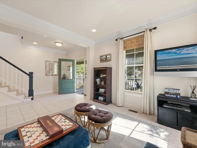 Welcome to 27444 S. Nicklaus Avenue, a refined coastal retreat on The Peninsula Golf and Country Club in Delaware - for sale on GolfHomes.com, golf home, golf lot