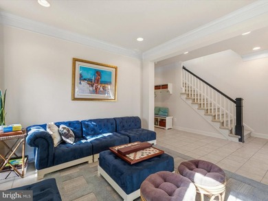 Welcome to 27444 S. Nicklaus Avenue, a refined coastal retreat on The Peninsula Golf and Country Club in Delaware - for sale on GolfHomes.com, golf home, golf lot