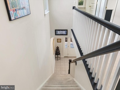 Welcome to 27444 S. Nicklaus Avenue, a refined coastal retreat on The Peninsula Golf and Country Club in Delaware - for sale on GolfHomes.com, golf home, golf lot