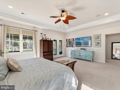 Welcome to 27444 S. Nicklaus Avenue, a refined coastal retreat on The Peninsula Golf and Country Club in Delaware - for sale on GolfHomes.com, golf home, golf lot