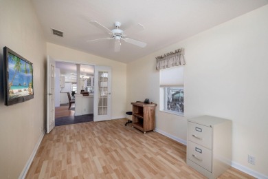 Enjoy peaceful water views and your own Mango Tree from this on Savanna Golf Club in Florida - for sale on GolfHomes.com, golf home, golf lot