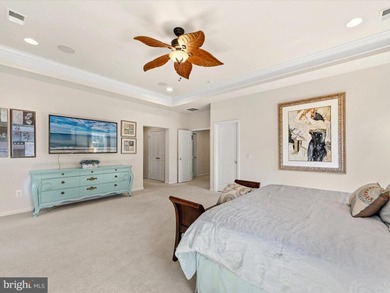 Welcome to 27444 S. Nicklaus Avenue, a refined coastal retreat on The Peninsula Golf and Country Club in Delaware - for sale on GolfHomes.com, golf home, golf lot