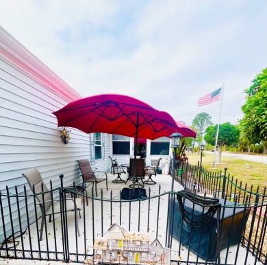 Charming 2-Bed, 2-Bath Home in Pine Lakes Country Club on Pine Lakes Country Club in Florida - for sale on GolfHomes.com, golf home, golf lot