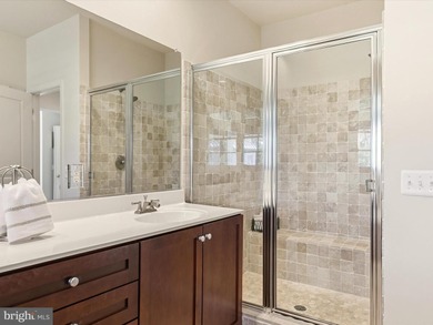 Welcome to 27444 S. Nicklaus Avenue, a refined coastal retreat on The Peninsula Golf and Country Club in Delaware - for sale on GolfHomes.com, golf home, golf lot