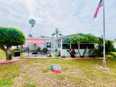 Charming 2-Bed, 2-Bath Home in Pine Lakes Country Club on Pine Lakes Country Club in Florida - for sale on GolfHomes.com, golf home, golf lot