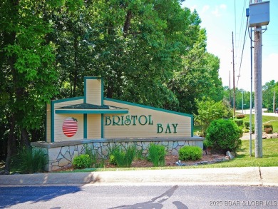 Walk in level lakefront ease in Sought-After Bristol Bay!  Don't on Seasons Ridge At Four Seasons in Missouri - for sale on GolfHomes.com, golf home, golf lot