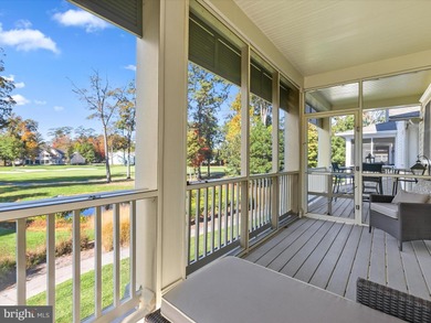 Welcome to 27444 S. Nicklaus Avenue, a refined coastal retreat on The Peninsula Golf and Country Club in Delaware - for sale on GolfHomes.com, golf home, golf lot